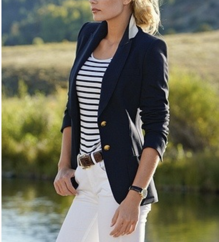 ways to style a navy blazer, outfit ideas for spring, woman wearing a striped tee, navy blazer, white denim and belt