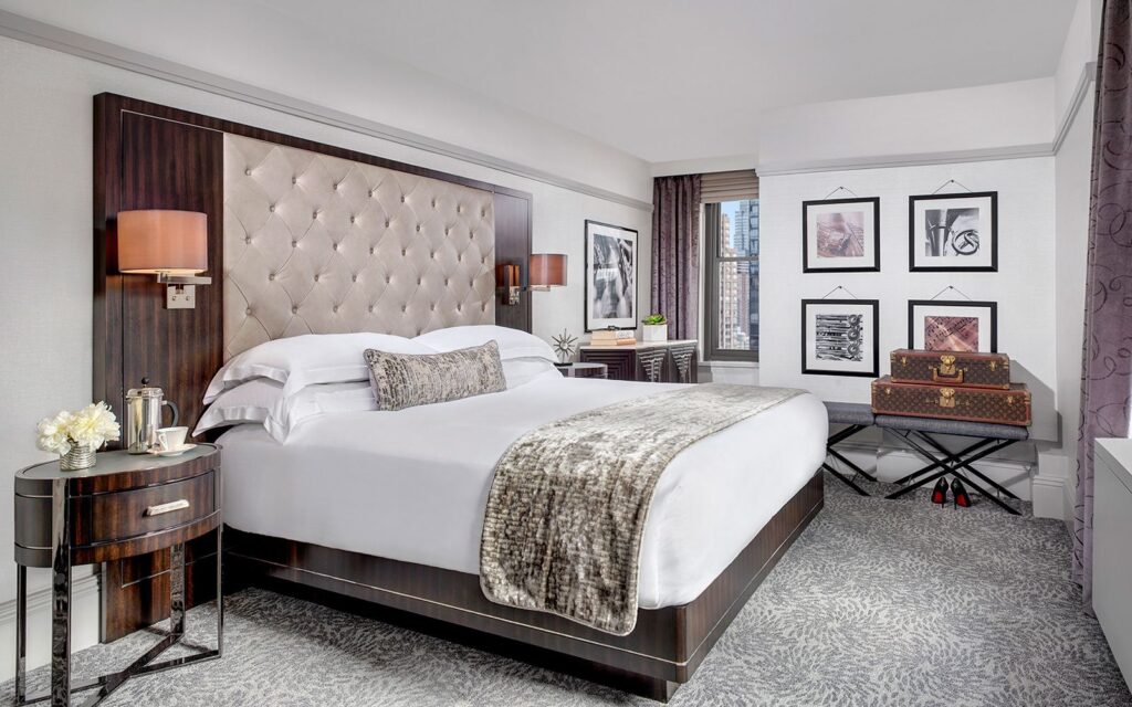 Best hotels in nyc under 500, the westhouse hotel kind room with beautiful bedding and details